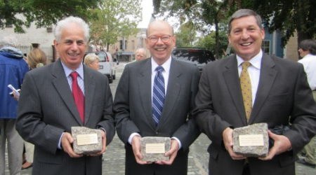 Commissioners Ed Solomon, Ron Lewis and Jeff Jones with commemorative pavers presented at the September ribbon-cutting