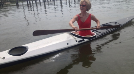 Katherine Kayaking during a recent vacation in St. Michaels, MD with a hand-carved Greenland paddle by Bob Baugh