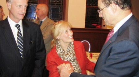 After the meeting, Linda Greenan (in red) of GU talks to Mayor Gray (right) as Councilmember Evans looks on