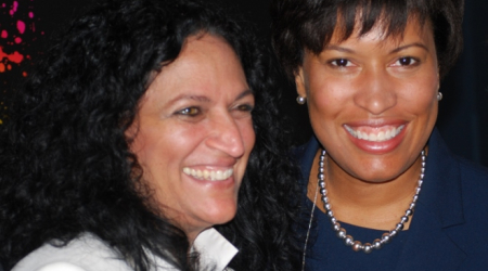 Marina Martins (left) and Mayor Muriel Bowser at news conference