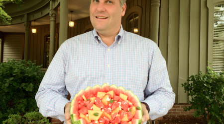 Robert Arnold Providing Sweet Summertime Melon Chunks with Fresh Mint and Crumbled Feta for a Potluck