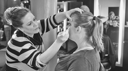 The women, who were treated to free makeovers Sunday at Bang Salon, anticipate their spouses’ return from Afghanistan in March.