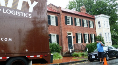 Roberto Matos of Security Storage Company readies the truck for DSK move