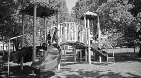 A new play structure with two slides and six swings will replace the current model shown here.