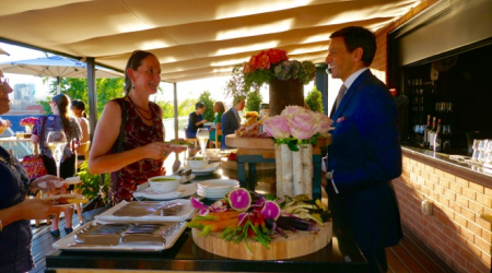 Rosewood Managing Director Pascal Forotti greets guests at the Rooftop Bar &amp; Lounge