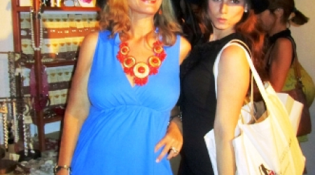 Allison Priebe Brooks, creator of Queen Bee Designs, and Allison Prescott model their new hats purchased at Proper Topper.