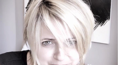 Sandra Villoteau Gomezand, Co-Owner of Salon Rive Gauche, sporting a layered Bob by Stylist, Tami Iams