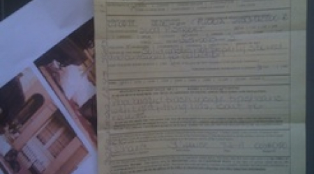 A fine notice posted on a Georgetown door