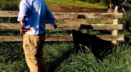 Simon Jacobsen with Black Angus calf