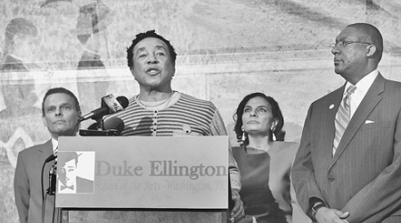 R&amp;B artist Smokey Robinson, with Ellington principal Rory Pullens, far right, spoke about the importance of arts education.