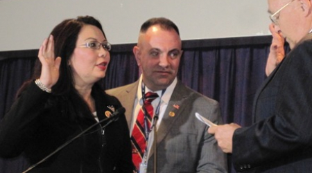 Tammy Duckworth (D-IL), her husband, and Judge Jack Farley