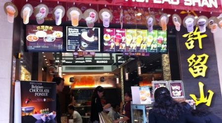 A tea shop - Hong Kong style. Starbucks and Pacific Coffee are right down the street.