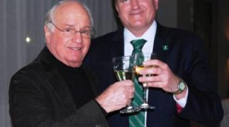 Shelly Gorland (left) Toasts Beasley's Success with Jim Bell