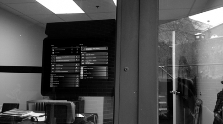 The display screens would go inside windows of participating businesses near bus stops.