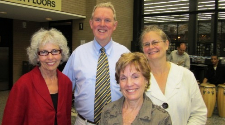 Ginnie Cooper, chief librarian, Councilmember Tommy Wells, Susan Haight, head of the Federation of Friends and Robin Diener, eve