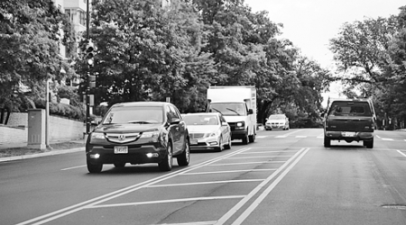 The new painted median is being removed from Calvert to Garfield streets, but will remain farther south in Glover Park.