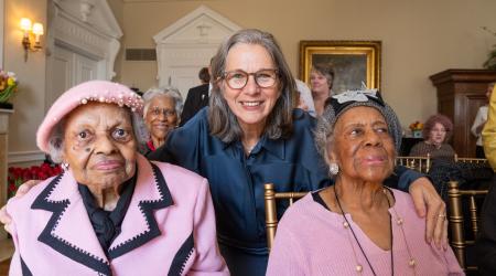Dorothy Boggess is on the left of Ambassador Birgitta Tazelaar, Velma Long is on the right